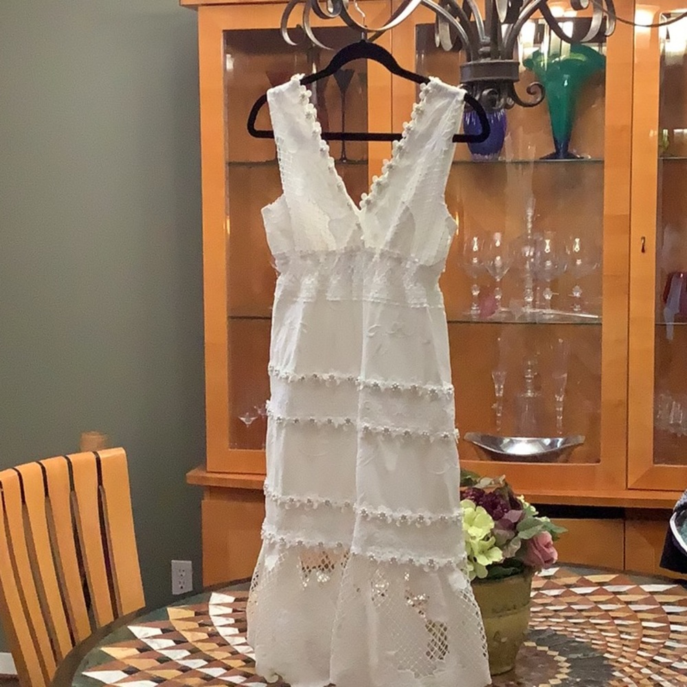 NWOT never worn bought and gained weight before I could wear it. gorgeous
